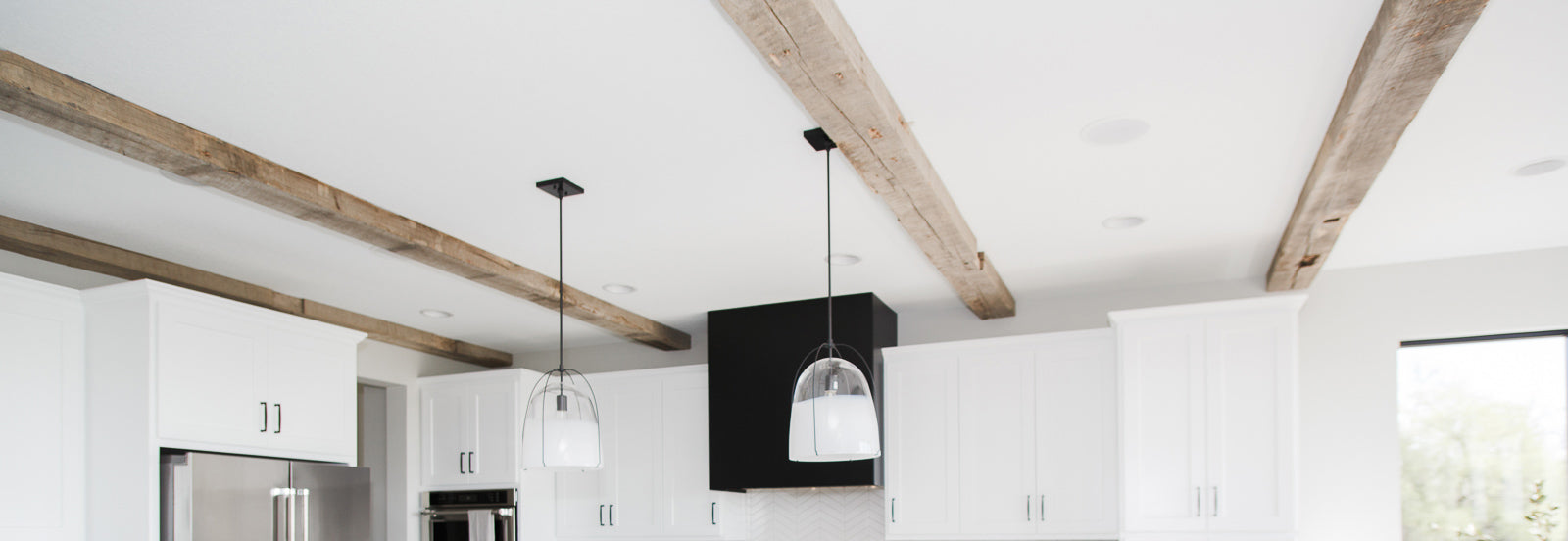 Reclaimed Wood Ceiling Beams and Mantel | Dakota Timber Company | Rustic Timber Beams | Studio West Fargo | Homebuilders in Fargo | Light Sanded Ceiling Beams | Modern Living Room
