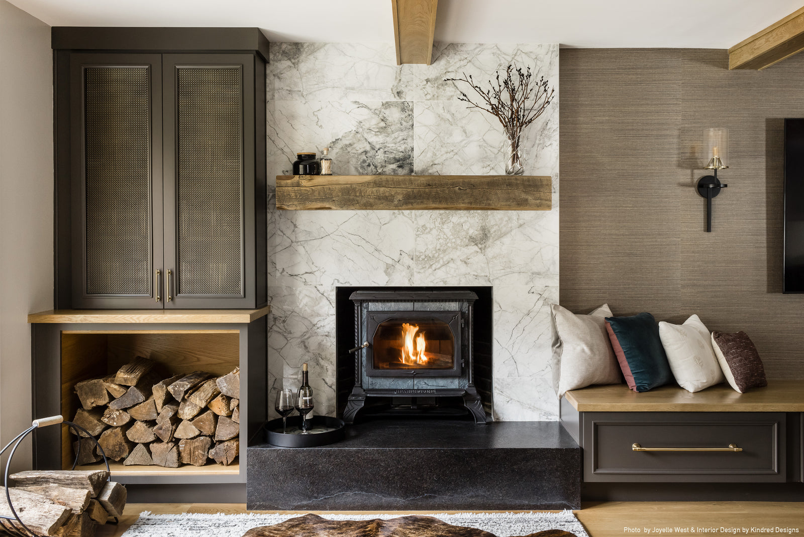 Kindred Designs Fireplace Mantel Installation - Photo by Joyelle West. Dakota Timber Co. Fireplace Mantel on marble wall.