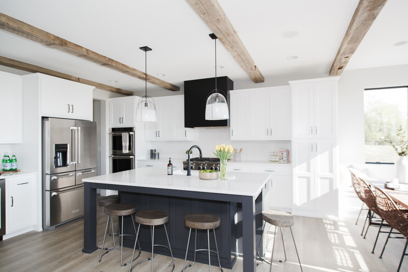 Reclaimed Wood Ceiling Beams and Mantel | Dakota Timber Company | Rustic Timber Beams in Kitchen