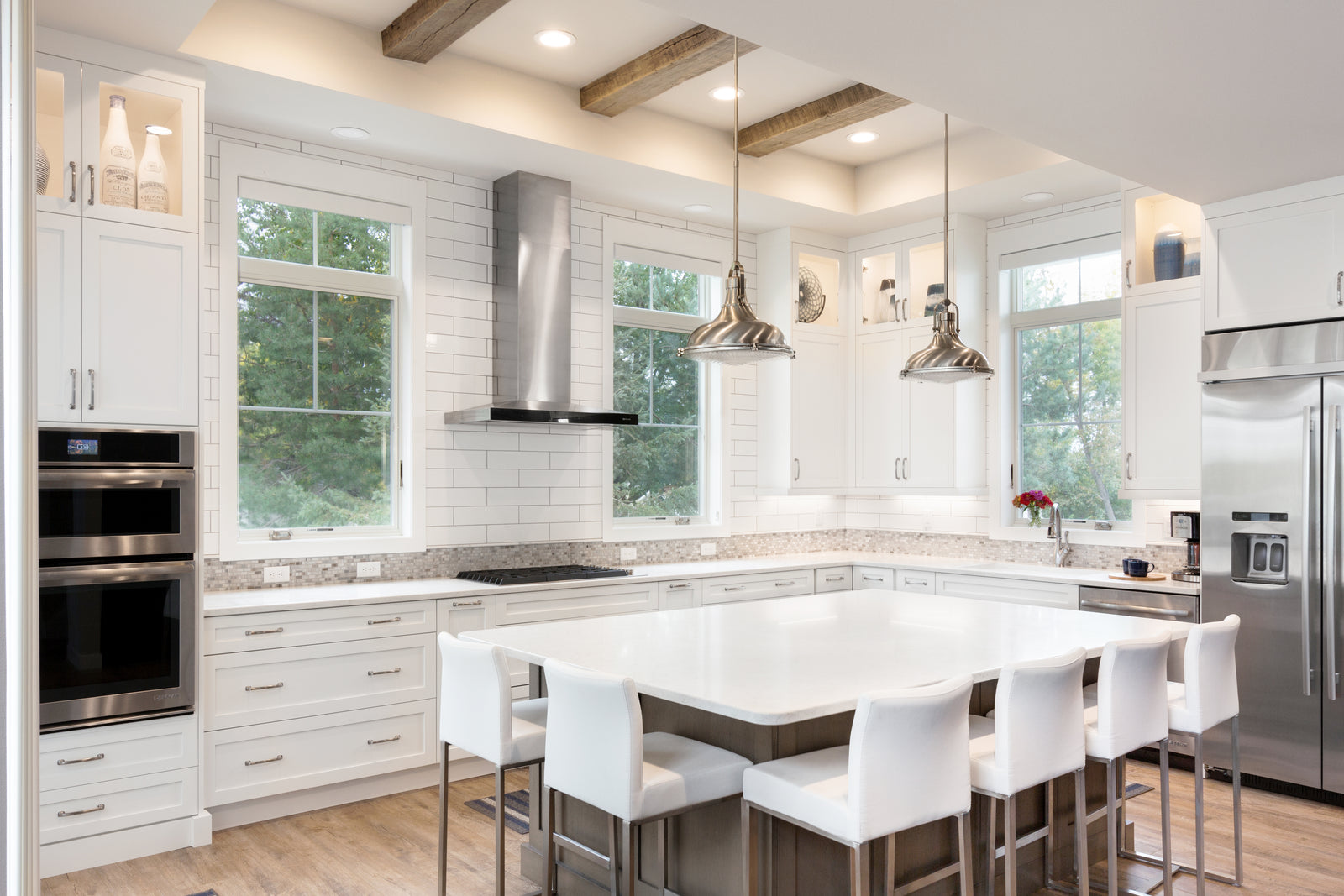 Reclaimed Wood Ceiling Beams and Mantel | Dakota Timber Company | Rustic Timber Beams in White Kitchen